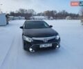 Черный Тойота Камри, объемом двигателя 2.49 л и пробегом 250 тыс. км за 14500 $, фото 1 на Automoto.ua