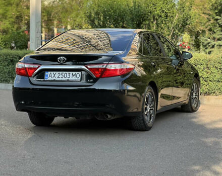 Чорний Тойота Камрі, об'ємом двигуна 2.49 л та пробігом 175 тис. км за 12000 $, фото 5 на Automoto.ua