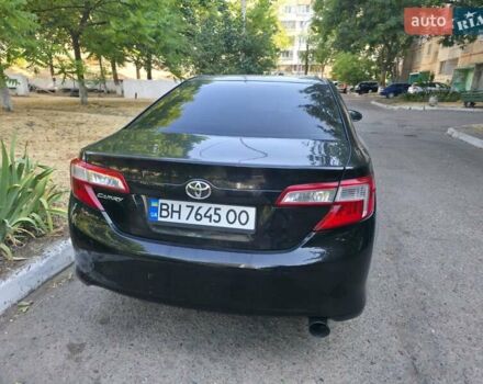Чорний Тойота Камрі, об'ємом двигуна 2.49 л та пробігом 180 тис. км за 11000 $, фото 2 на Automoto.ua