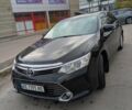 Черный Тойота Камри, объемом двигателя 2.49 л и пробегом 205 тыс. км за 16450 $, фото 1 на Automoto.ua