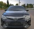 Черный Тойота Камри, объемом двигателя 2.5 л и пробегом 141 тыс. км за 15400 $, фото 1 на Automoto.ua