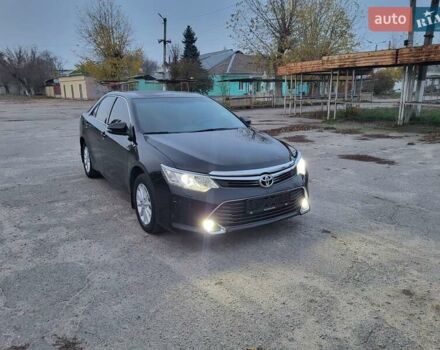 Черный Тойота Камри, объемом двигателя 2.5 л и пробегом 183 тыс. км за 14900 $, фото 1 на Automoto.ua