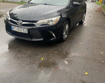 Черный Тойота Камри, объемом двигателя 2.5 л и пробегом 130 тыс. км за 15700 $, фото 1 на Automoto.ua