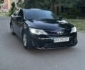 Черный Тойота Камри, объемом двигателя 2.5 л и пробегом 145 тыс. км за 8800 $, фото 1 на Automoto.ua