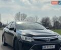 Черный Тойота Камри, объемом двигателя 2.49 л и пробегом 176 тыс. км за 15300 $, фото 1 на Automoto.ua