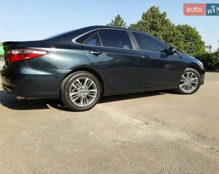 Черный Тойота Камри, объемом двигателя 2.49 л и пробегом 231 тыс. км за 12200 $, фото 4 на Automoto.ua