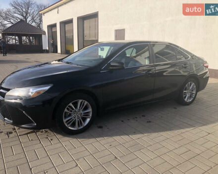 Чорний Тойота Камрі, об'ємом двигуна 2.5 л та пробігом 200 тис. км за 14000 $, фото 2 на Automoto.ua