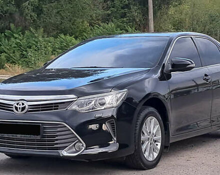 Чорний Тойота Камрі, об'ємом двигуна 2.5 л та пробігом 141 тис. км за 15400 $, фото 1 на Automoto.ua