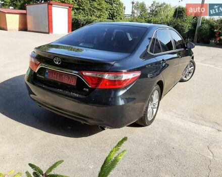 Черный Тойота Камри, объемом двигателя 2.49 л и пробегом 231 тыс. км за 12200 $, фото 21 на Automoto.ua