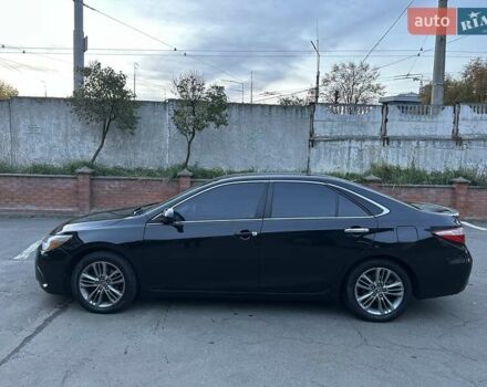 Чорний Тойота Камрі, об'ємом двигуна 2.5 л та пробігом 145 тис. км за 14500 $, фото 1 на Automoto.ua