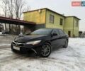 Чорний Тойота Камрі, об'ємом двигуна 2.49 л та пробігом 200 тис. км за 11700 $, фото 1 на Automoto.ua