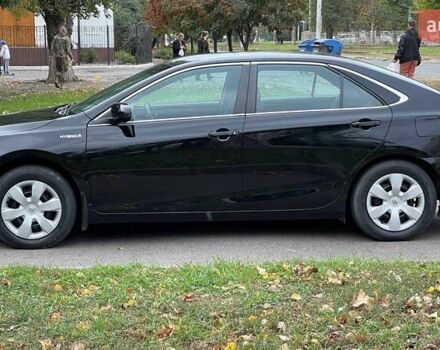 Черный Тойота Камри, объемом двигателя 2.5 л и пробегом 205 тыс. км за 12500 $, фото 1 на Automoto.ua