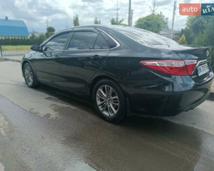 Чорний Тойота Камрі, об'ємом двигуна 2.5 л та пробігом 174 тис. км за 14500 $, фото 2 на Automoto.ua