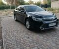 Черный Тойота Камри, объемом двигателя 2.5 л и пробегом 143 тыс. км за 17000 $, фото 1 на Automoto.ua