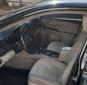 Черный Тойота Камри, объемом двигателя 2.49 л и пробегом 200 тыс. км за 13850 $, фото 5 на Automoto.ua