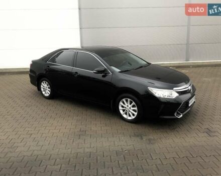 Черный Тойота Камри, объемом двигателя 2.5 л и пробегом 148 тыс. км за 17500 $, фото 1 на Automoto.ua