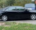 Черный Тойота Камри, объемом двигателя 2.5 л и пробегом 205 тыс. км за 12500 $, фото 1 на Automoto.ua