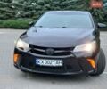Черный Тойота Камри, объемом двигателя 2.49 л и пробегом 229 тыс. км за 12750 $, фото 1 на Automoto.ua