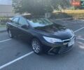 Черный Тойота Камри, объемом двигателя 2.5 л и пробегом 107 тыс. км за 17500 $, фото 1 на Automoto.ua