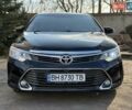 Черный Тойота Камри, объемом двигателя 2.49 л и пробегом 165 тыс. км за 15900 $, фото 1 на Automoto.ua