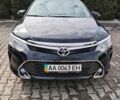 Чорний Тойота Камрі, об'ємом двигуна 2.5 л та пробігом 230 тис. км за 14500 $, фото 1 на Automoto.ua