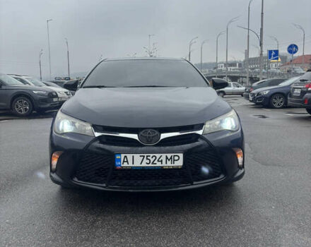 Черный Тойота Камри, объемом двигателя 2.5 л и пробегом 143 тыс. км за 12900 $, фото 1 на Automoto.ua