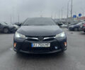 Черный Тойота Камри, объемом двигателя 2.5 л и пробегом 143 тыс. км за 12900 $, фото 1 на Automoto.ua