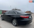 Черный Тойота Камри, объемом двигателя 2.49 л и пробегом 145 тыс. км за 11999 $, фото 4 на Automoto.ua