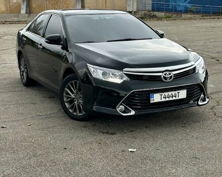 Черный Тойота Камри, объемом двигателя 2.5 л и пробегом 185 тыс. км за 17000 $, фото 1 на Automoto.ua