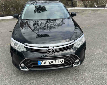 Черный Тойота Камри, объемом двигателя 2.49 л и пробегом 260 тыс. км за 16500 $, фото 1 на Automoto.ua