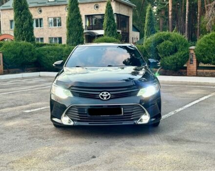 Черный Тойота Камри, объемом двигателя 2.5 л и пробегом 157 тыс. км за 16200 $, фото 1 на Automoto.ua