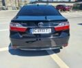 Черный Тойота Камри, объемом двигателя 2.5 л и пробегом 230 тыс. км за 16990 $, фото 16 на Automoto.ua