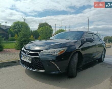 Чорний Тойота Камрі, об'ємом двигуна 2.5 л та пробігом 174 тис. км за 14500 $, фото 1 на Automoto.ua