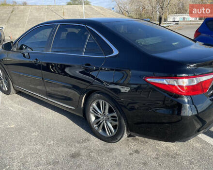 Черный Тойота Камри, объемом двигателя 2.49 л и пробегом 163 тыс. км за 15500 $, фото 5 на Automoto.ua