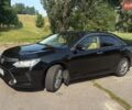 Черный Тойота Камри, объемом двигателя 2.49 л и пробегом 280 тыс. км за 16500 $, фото 1 на Automoto.ua