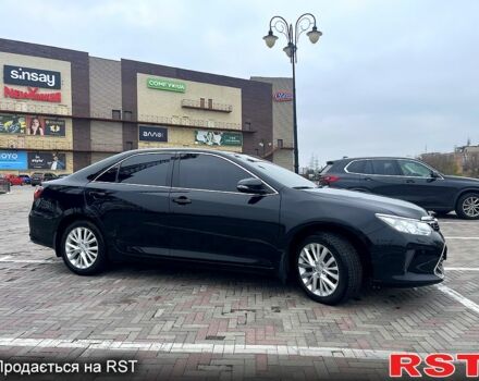 Черный Тойота Камри, объемом двигателя 2.5 л и пробегом 165 тыс. км за 16600 $, фото 10 на Automoto.ua
