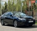 Черный Тойота Камри, объемом двигателя 2.49 л и пробегом 120 тыс. км за 13000 $, фото 1 на Automoto.ua