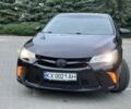 Черный Тойота Камри, объемом двигателя 2.5 л и пробегом 229 тыс. км за 12608 $, фото 1 на Automoto.ua