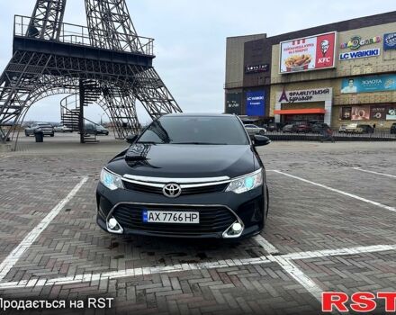 Черный Тойота Камри, объемом двигателя 2.5 л и пробегом 165 тыс. км за 16600 $, фото 1 на Automoto.ua