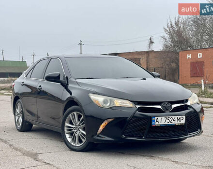 Черный Тойота Камри, объемом двигателя 2.49 л и пробегом 145 тыс. км за 11999 $, фото 1 на Automoto.ua