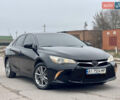 Черный Тойота Камри, объемом двигателя 2.49 л и пробегом 145 тыс. км за 11999 $, фото 1 на Automoto.ua