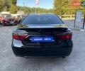 Чорний Тойота Камрі, об'ємом двигуна 2.49 л та пробігом 235 тис. км за 13000 $, фото 5 на Automoto.ua