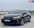 Черный Тойота Камри, объемом двигателя 2.49 л и пробегом 145 тыс. км за 11999 $, фото 1 на Automoto.ua