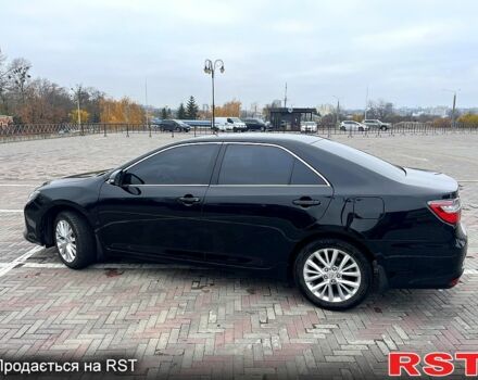 Черный Тойота Камри, объемом двигателя 2.5 л и пробегом 165 тыс. км за 16600 $, фото 4 на Automoto.ua