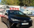 Черный Тойота Камри, объемом двигателя 2.49 л и пробегом 150 тыс. км за 12700 $, фото 1 на Automoto.ua