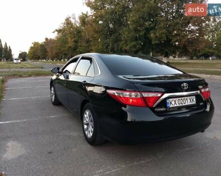 Чорний Тойота Камрі, об'ємом двигуна 2.49 л та пробігом 230 тис. км за 13000 $, фото 1 на Automoto.ua