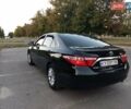 Чорний Тойота Камрі, об'ємом двигуна 2.49 л та пробігом 230 тис. км за 13000 $, фото 1 на Automoto.ua