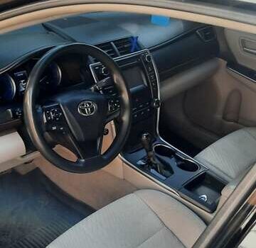 Черный Тойота Камри, объемом двигателя 2.49 л и пробегом 200 тыс. км за 13850 $, фото 1 на Automoto.ua