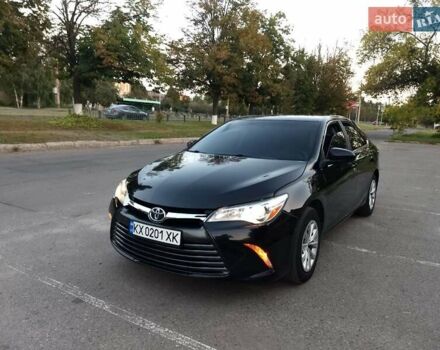 Чорний Тойота Камрі, об'ємом двигуна 2.49 л та пробігом 230 тис. км за 13000 $, фото 2 на Automoto.ua
