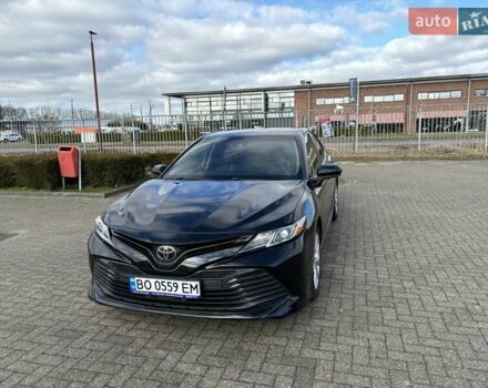 Черный Тойота Камри, объемом двигателя 2.5 л и пробегом 167 тыс. км за 18000 $, фото 1 на Automoto.ua